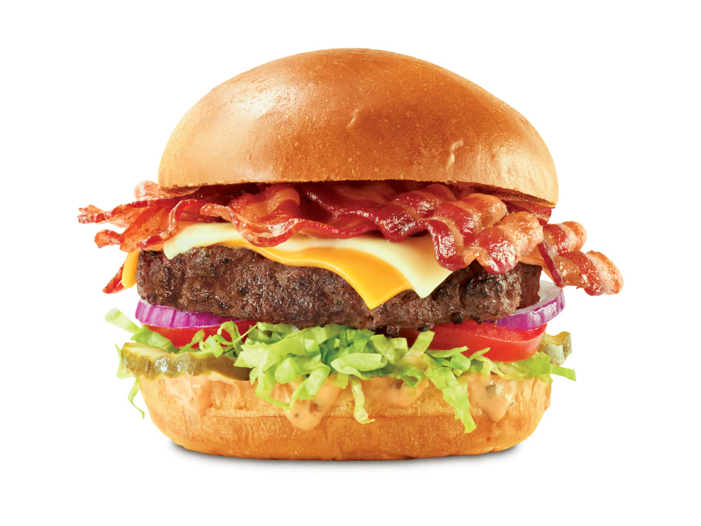 Arby's Big Cheesy Bacon Burger featuring a beef patty with bacon, American and Swiss cheeses, lettuce, tomato, onions, pickles, and burger sauce on a toasted brioche bun.