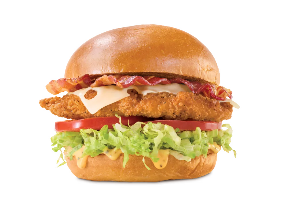 Arby's Chicken Bacon & Swiss Sandwich with crispy chicken, bacon, Swiss cheese, lettuce, tomato, and honey mustard on a toasted brioche bun.