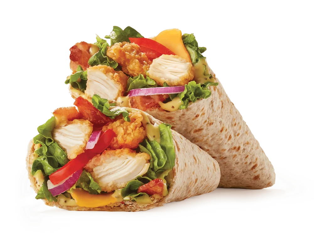 Arby's Crispy Chicken Club Wrap with crispy chicken, bacon, cheddar cheese, lettuce, tomato, red onion, and honey mustard in an artisan wrap.