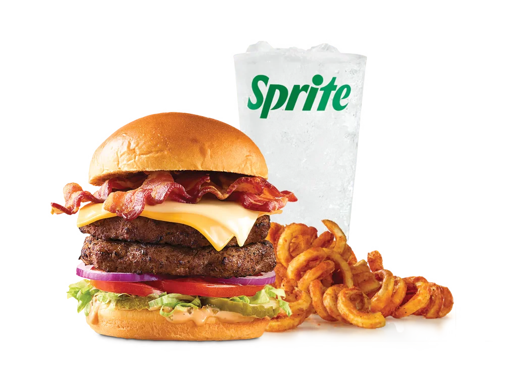 Arby's Double Big Cheesy Bacon Burger with two beef patties, bacon, American and Swiss cheeses, lettuce, tomato, onions, pickles, and burger sauce on a toasted brioche bun, served with medium curly fries and a medium soft drink.