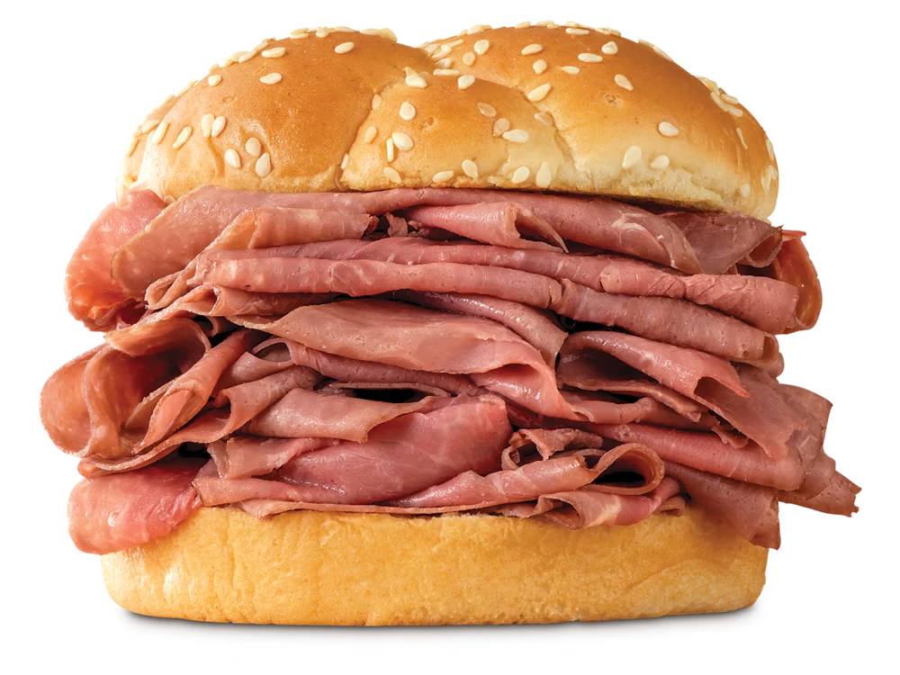 Arby's Double Roast Beef sandwich with twice the amount of thinly sliced roast beef on a toasted sesame seed bun.