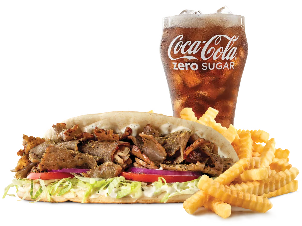 Arby's Greek Gyro filled with gyro meat, lettuce, tomatoes, red onions, and tzatziki sauce, served with medium curly fries and a medium soft drink.