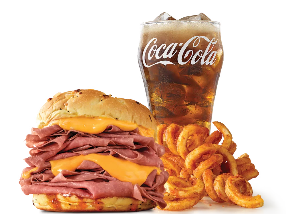 Arby's Half Pound Beef 'n Cheddar Sandwich with roast beef, cheddar cheese sauce, and Red Ranch on a toasted onion roll, served with medium curly fries and a medium soft drink.