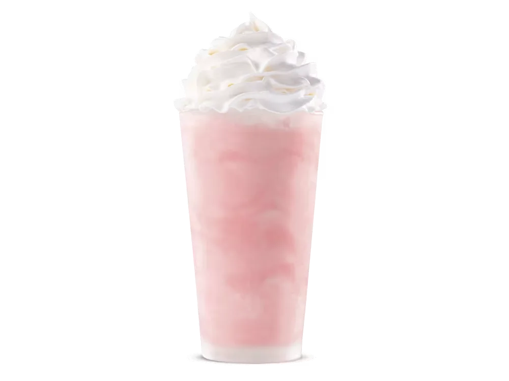 Arby's Strawberry Shake topped with whipped cream.